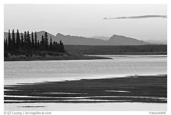 Sand bar shore, river and Baird mountains, evening. Kobuk Valley National Park (black and white)