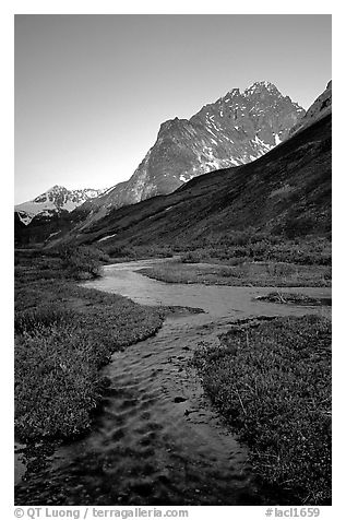 Stream on plain  below the Telaquana Mountains, late afternoon. Lake Clark National Park (black and white)
