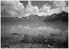 Clouds and Telaquana Mountains above Turquoise Lake, from the middle of the lake. Lake Clark National Park, Alaska, USA. (black and white)