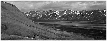 Summer mountain landscape with cloudy skies. Lake Clark National Park (Panoramic black and white)