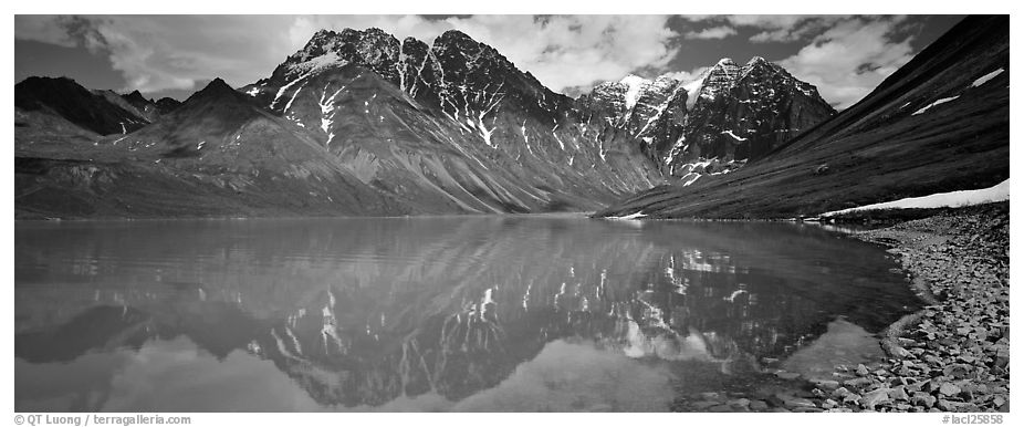 Tall mountains reflected in Turquoise Lake. Lake Clark National Park (black and white)