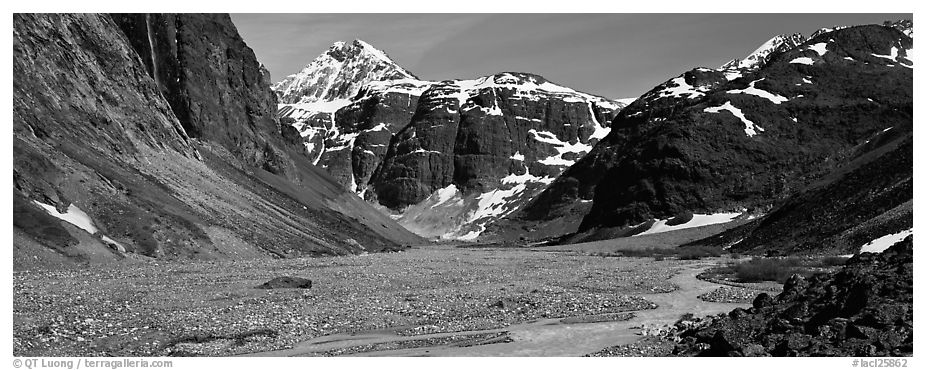 Valley, distant waterfall, and mountains. Lake Clark National Park (black and white)