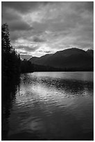 Kontrashibuna Lake with sunrise cloud reflections. Lake Clark National Park ( black and white)