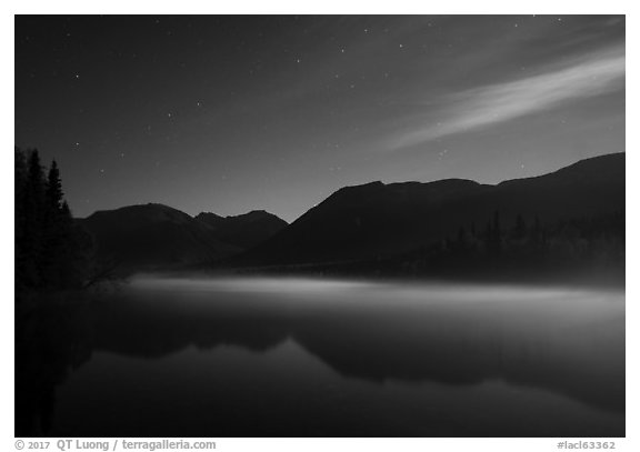 Kontrashibuna Lake with thin layer of mist at night. Lake Clark National Park (black and white)