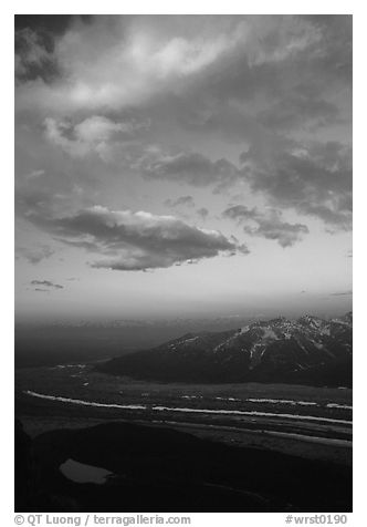 Clouds, glacier, and mountains seen from above. Wrangell-St Elias National Park (black and white)