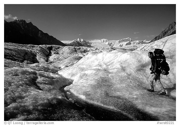 Backpacker on Root glacier. Wrangell-St Elias National Park, Alaska, USA.