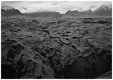 Glacier covered with black rocks. Wrangell-St Elias National Park ( black and white)