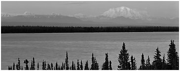 Snowy mountain rising mysteriously above lake. Wrangell-St Elias National Park (Panoramic black and white)