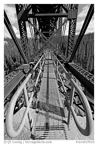 Foot catwalk below the Kuskulana river bridge. Wrangell-St Elias National Park (black and white)