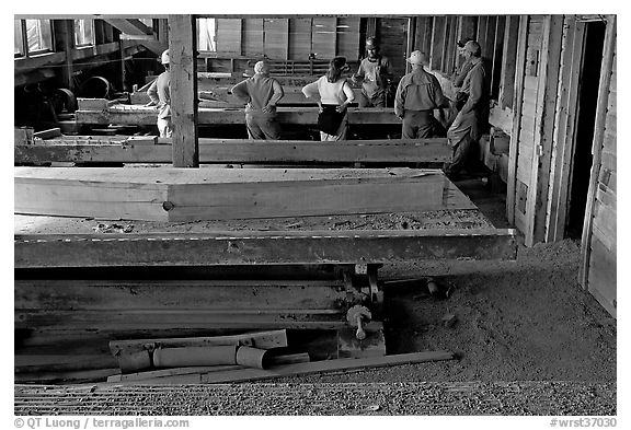 Tour group visiting the Kennecott mill plant. Wrangell-St Elias National Park (black and white)