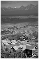 Kennecott mill town buildings and moraines of Root Glacier. Wrangell-St Elias National Park, Alaska, USA. (black and white)