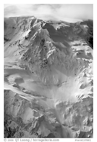 Aerial view of icy face with hanging glaciers and seracs. Wrangell-St Elias National Park, Alaska, USA.