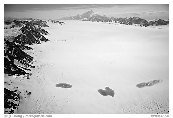 Aerial view of Bagley Field with turquoise snow melt lakes. Wrangell-St Elias National Park, Alaska, USA.