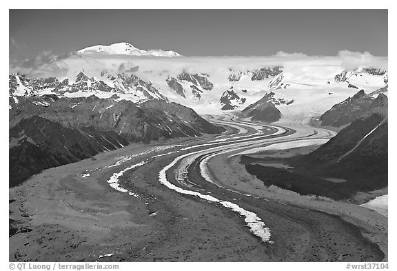 Aerial view of ice bands and moraines of Kennicott Glacier and Mt Blackburn. Wrangell-St Elias National Park, Alaska, USA.