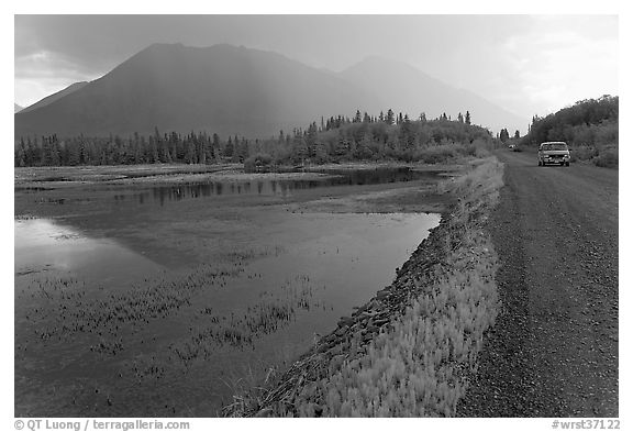 McCarthy Road and lake during afternoon storm. Wrangell-St Elias National Park (black and white)