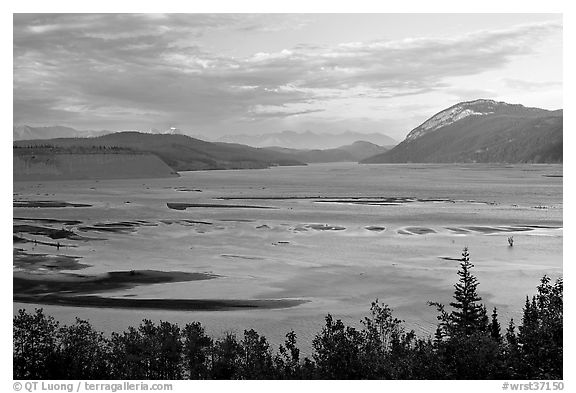 Wide Copper River at sunset. Wrangell-St Elias National Park, Alaska, USA.