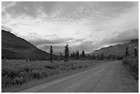 Nabena road at sunset. Wrangell-St Elias National Park, Alaska, USA. (black and white)