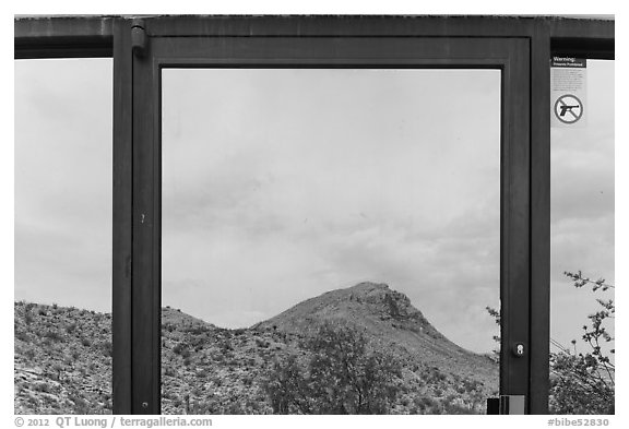 Santiago mountains, Persimmon Gap Visitor Center window reflexion. Big Bend National Park (black and white)