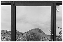 Santiago mountains, Persimmon Gap Visitor Center window reflexion. Big Bend National Park, Texas, USA. (black and white)