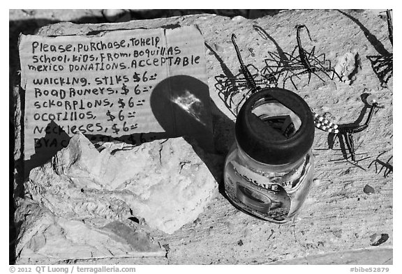 Mexican handicrafts offers on honor system. Big Bend National Park (black and white)