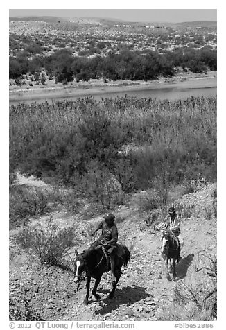 Mexican horsemen from Boquillas Village. Big Bend National Park (black and white)