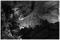 Park visitor looking,  room above Whales Mouth. Carlsbad Caverns National Park, New Mexico, USA. (black and white)