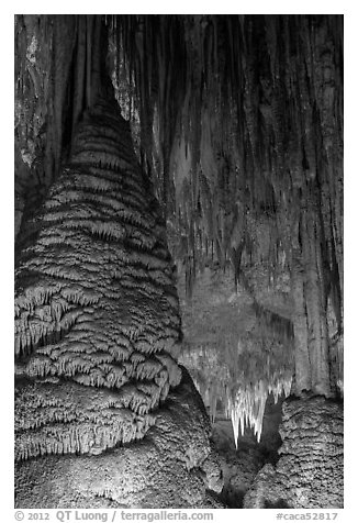 Stalagmite and flowstone framing chandelier. Carlsbad Caverns National Park, New Mexico, USA.