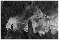 Park visitor looking, cave room. Carlsbad Caverns National Park, New Mexico, USA. (black and white)