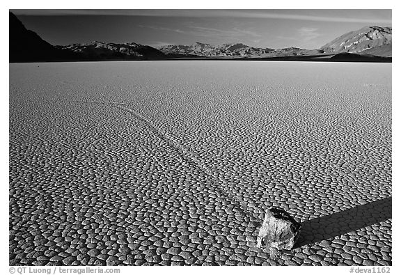 Tracks, moving rock on the Racetrack, late afternoon. Death Valley National Park, California, USA.