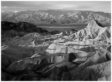 Badlands, Valley, and Telescope Peak from Zabriskie Point, winter sunrise. Death Valley National Park, California, USA. (black and white)