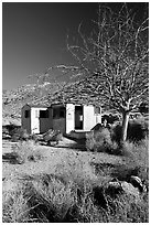 Cabin of Pete Aguereberry's mining camp in the Panamint Mountains, afternoon. Death Valley National Park, California, USA. (black and white)