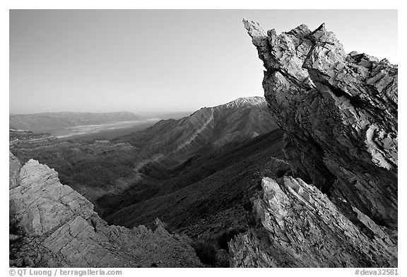 Rocks framing the Death Valley view from Aguereberry point, dusk. Death Valley National Park, California, USA.