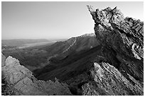 Rocks framing the Death Valley view from Aguereberry point, dusk. Death Valley National Park ( black and white)