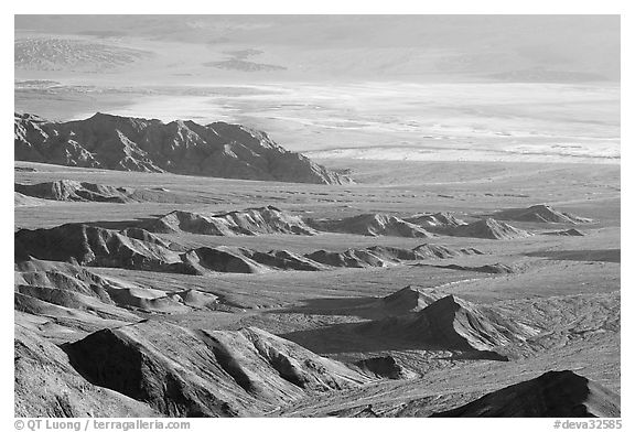 Eroded hills and salt pan from Aguereberry point, early morning. Death Valley National Park (black and white)