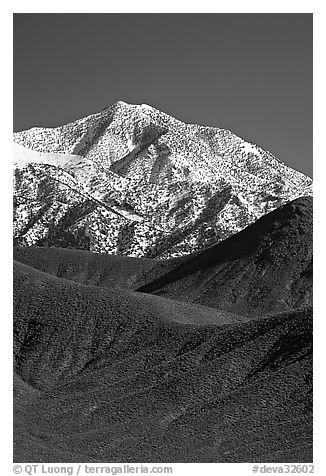 Telescope peak rising above sage-covered hills. Death Valley National Park, California, USA.
