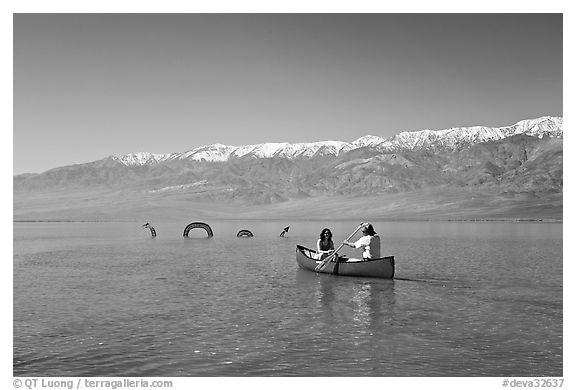 Canoe near the dragon in Manly Lake, below the Panamint Range. Death Valley National Park (black and white)