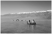 Canoe near the dragon in Manly Lake, below the Panamint Range. Death Valley National Park ( black and white)