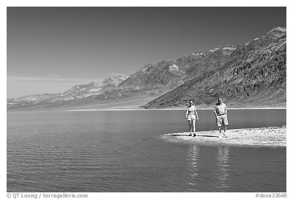 Couple on the shores of Manly Lake. Death Valley National Park (black and white)