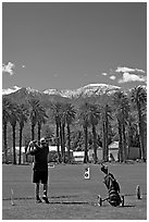 Golfer in Furnace Creek Golf course. Death Valley National Park ( black and white)