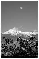 Moon and Panamint Range seen from the West. Death Valley National Park, California, USA. (black and white)