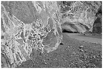 Patterned wall and road, Titus Canyon. Death Valley National Park, California, USA. (black and white)