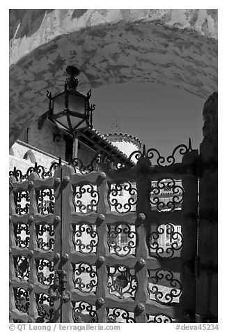 Gate, lamp, and arch, Scotty's Castle. Death Valley National Park (black and white)
