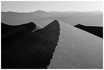 Dune ridges and Panamint Range. Death Valley National Park ( black and white)