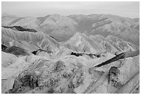 Badlands and mountains at sunrise, Twenty Mule Team Canyon. Death Valley National Park ( black and white)