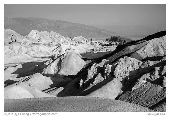 Twenty Mule Team Canyon and distant valley. Death Valley National Park (black and white)