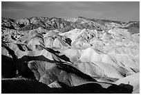 Visitor looking, Twenty Mule Team Canyon. Death Valley National Park ( black and white)