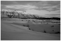 Salt Basin dunes and Guadalupe range at sunset. Guadalupe Mountains National Park, Texas, USA. (black and white)