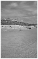 Gypsum sand dunes and Guadalupe range at sunset. Guadalupe Mountains National Park ( black and white)