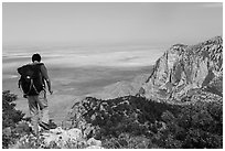 Hiker walking on Guadalupe Peak. Guadalupe Mountains National Park ( black and white)