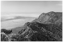 Hiker surveying view over mountains and plains. Guadalupe Mountains National Park ( black and white)